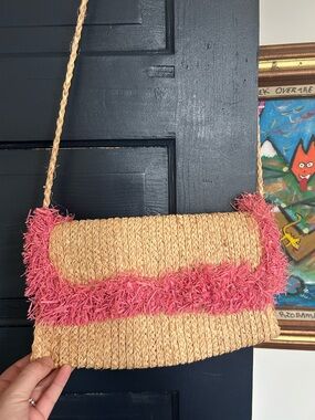 Woven Straw Shoulder Bag with Pink Fringe Trim